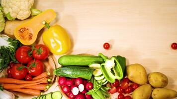 Assorted vegetables arranged neatly on wooden surface video