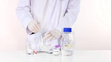 Scientist stirring substances in a laboratory setting video