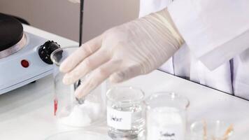 Demonstrating sodium acetate crystallization in a laboratory setting video