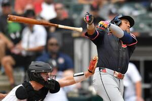 Cleveland Guardians third baseman Jose Ramirez (11) loses his bat during the third inning against the Chicago White Sox at Rate Field. editorial_image