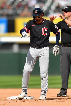 Cleveland Guardians second baseman Daniel Schneemann (10) reacts after hitting a double during the fourth inning against the Chicago White Sox at Rate Field. editorial_image
