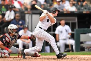 Chicago White Sox catcher Kyle Teel (8) hits a two-run single during the fourth inning against the Cleveland Guardians at Rate Field. editorial_image