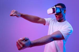 Man experiencing virtual reality excitement photo
