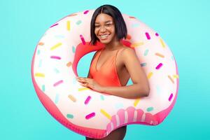 Woman with donut-shaped float photo