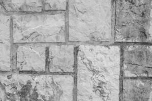 Grey Stone wall. Texture or Background in monochrome. Black and White background. photo