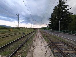 Passenger platform of the railway station photo