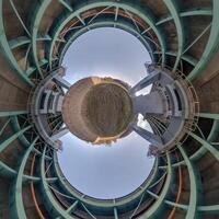 A circular view of a building with a large circular hole photo