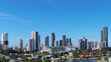 A static view of Gold Coast's skyline with modern skyscrapers against a bright blue sky, captured in daylight video