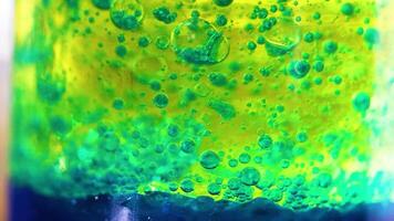 Bubbling liquid in a vibrant laboratory setup video