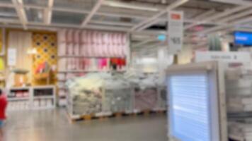 Fast-paced view of a bustling warehouse video