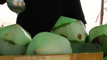 Sequential steps of opening a fresh coconut video