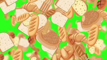 Various breads falling against a green backdrop video
