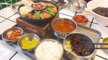 A vibrant display of Korean cuisine in Bangkok, showcasing traditional dishes with dynamic camera angles and bright lighting video