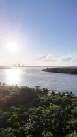 Aerial footage captures the serene Gold Coast landscape with the sun setting over the Nerang River and Broadwater video