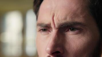 Close up annoyed stressed angry Caucasian businessman mad guy business man using mobile phone typing message texting smartphone online chatting gadget in hands dissatisfied employer male in office video