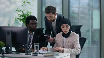 Multiracial diversity multiethnic business team colleagues arguing about online computer working paper document discuss in office misunderstanding talking solving problem talk job difficulty trouble video
