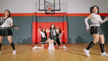 Dynamic Dance Performance in Basketball Gym video