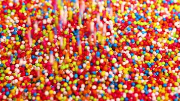 Vibrant sprinkles cascading in a dynamic display video
