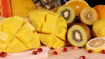 A vibrant assortment of sliced and whole fruits video