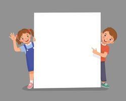 Cute little boy and girl standing behind empty banner peeking and pointing finger over the board waving hand vector