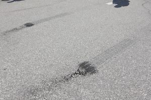 Tire Marks Left on the Asphalt Surface During Various Driving Events and Conditions photo