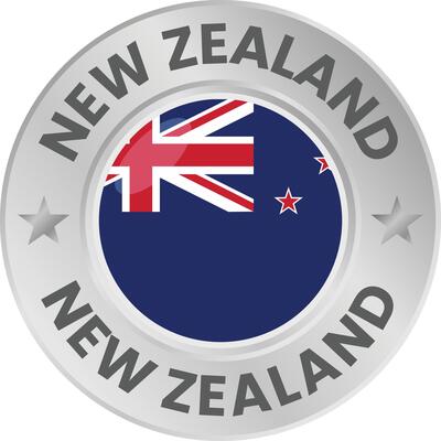 New Zealand flag in silver colored medal. National flag in metal circle emblem.