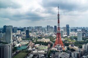 Tokyo, Japan-august 6, 2024-the famous Tokyo Tower seen from the Azabudai hills observatory during a cloudy day photo