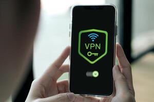 Smartphone screen shows VPN with security system. Concept of Virtual Private Network, technology for connecting private network to public internet. photo
