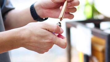 Sequential lighting of incense stick with lighter video