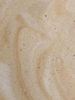 Coffee foam for background. Coffee foam texture... photo