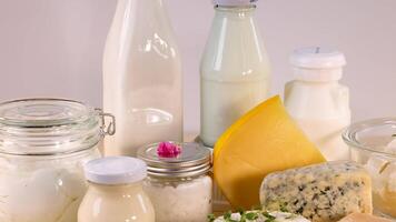 Various dairy items arranged on a background video