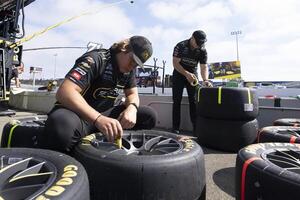 Crew to NASCAR Cup Series driver Michael McDowell (not pictured) maintain the tires at Sonoma Raceway. editorial_image
