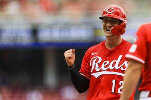 Cincinnati Reds outfielder Austin Hays (12) reacts after hitting a RBI single in the third inning against the Colorado Rockies at Great American Ball Park. editorial_image
