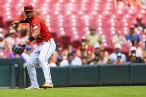 Cincinnati Reds third baseman Santiago Espinal (4) throws to first to get Colorado Rockies shortstop Ryan Ritter (not pictured) out in the third inning at Great American Ball Park. editorial_image