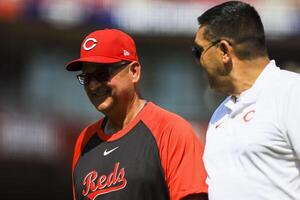Cincinnati Reds manager Terry Francona (77) walks off the field during a stop in play in the eighth inning against the Colorado Rockies at Great American Ball Park. editorial_image