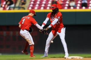 Cincinnati Reds second baseman Matt McLain (9) and shortstop Elly De La Cruz (44) celebrate after the victory over the Colorado Rockies at Great American Ball Park. editorial_image