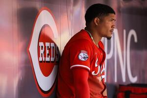 Cincinnati Reds designated hitter Noelvi Marte (16) sits in the dugout in the ninth inning against the Colorado Rockies at Great American Ball Park. editorial_image
