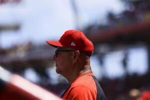 Cincinnati Reds manager Terry Francona (77) sits in the dugout during the seventh inning against the Colorado Rockies at Great American Ball Park. editorial_image