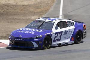 NASCAR Cup Series driver Bubba Wallace (23) navigates around Turn 4 at Sonoma Raceway. editorial_image