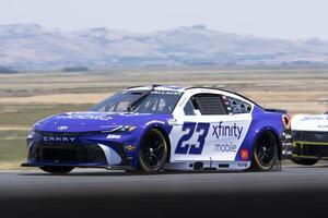 NASCAR Cup Series driver Bubba Wallace (23) navigates around Turn 2 at Sonoma Raceway. editorial_image