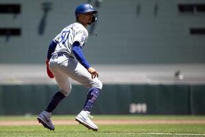 Los Angeles Dodgers shortstop Mookie Betts (50) dances off third base against the San Francisco Giants during the fourth inning at Oracle Park. editorial_image