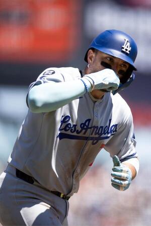 Los Angeles Dodgers third baseman Miguel Rojas (72) runs out his solo home run against the San Francisco Giants during the fifth inning at Oracle Park. editorial_image