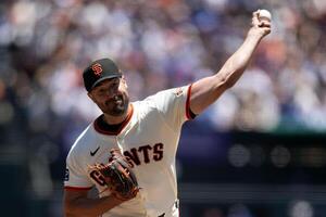 San Francisco Giants starting pitcher Robbie Ray (38) delivers  a pitch against the Los Angeles Dodgers during the first inning at Oracle Park. editorial_image
