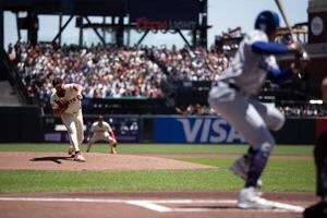 San Francisco Giants starting pitcher Robbie Ray (38) delivers  a pitch against the Los Angeles Dodgers during the first inning at Oracle Park. editorial_image