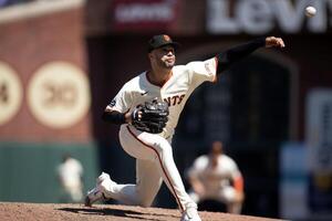 San Francisco Giants pitcher Joey Lucchesi (57) delivers a pitch against the Los Angeles Dodgers during the tenth inning at Oracle Park. editorial_image