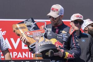 NASCAR Cup Series driver Shane van Gisbergen (88) admires the trophy after winning the NASCAR Toyota / Save Mart 350 at Sonoma Raceway. editorial_image