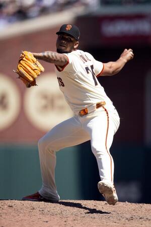 San Francisco Giants pitcher Camilo Doval (75) delivers a pitch against the Los Angeles Dodgers during the ninth inning at Oracle Park. editorial_image