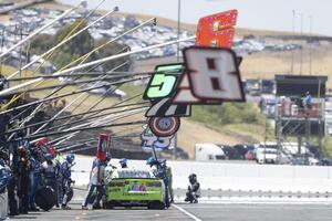 The pit crew for NASCAR Cup Series driver AJ Allmendinger (16) work on the vehicle at Sonoma Raceway. editorial_image