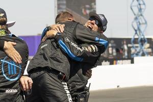 Crew members for NASCAR Cup Series driver Shane van Gisbergen (not pictured) react after winning the NASCAR Toyota / Save Mart 350 at Sonoma Raceway. editorial_image