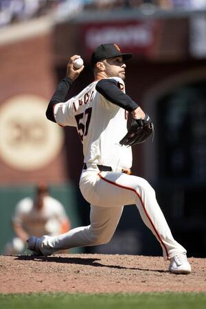San Francisco Giants pitcher Joey Lucchesi (57) delivers a pitch against the Los Angeles Dodgers during the tenth inning at Oracle Park. editorial_image